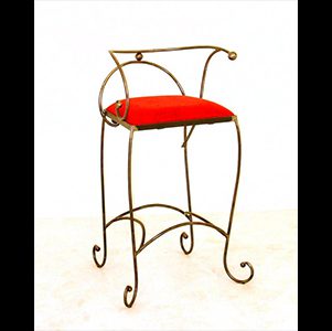A red chair with a metal frame and legs.