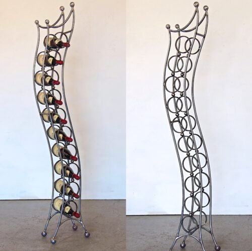A metal rack with wine bottles on top of it.