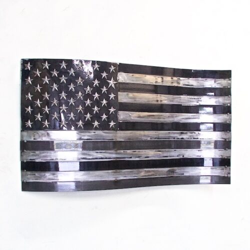 A black and white american flag on the wall