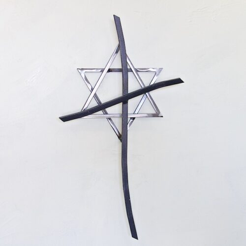 A cross and star of david are hanging on the wall.