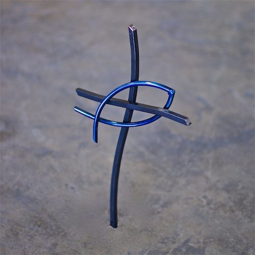 A cross made of wire and plastic.