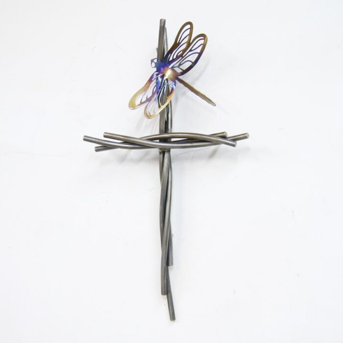 A cross made of sticks and wire with a blue ribbon on it.