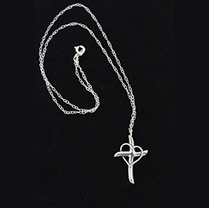 A cross with a heart on it is shown.