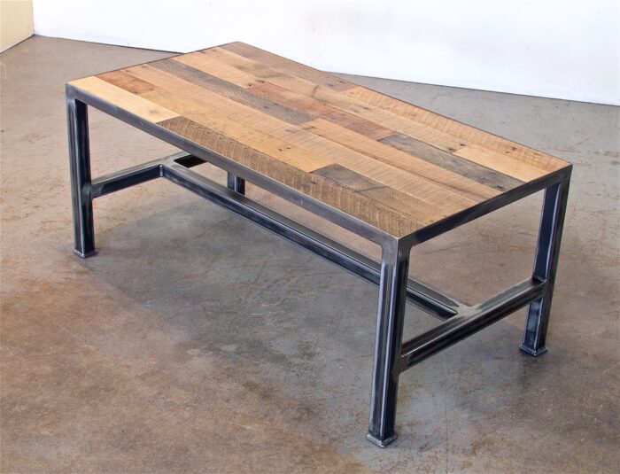 A coffee table with metal legs and wooden top