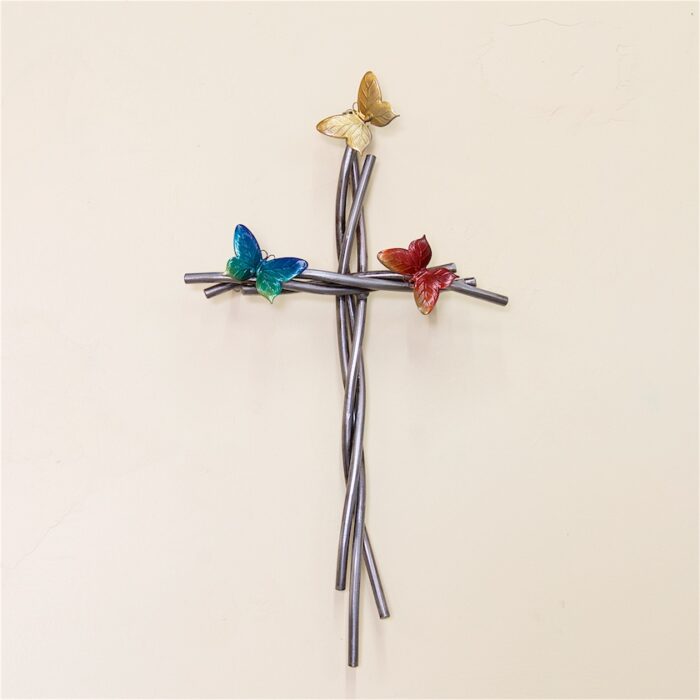 A cross with three butterflies on it.